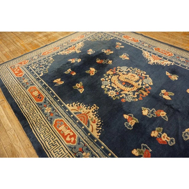 Extraordinary Navy Blue Color With a Dragon and Chinoiserie Design Antique Chinese Peking Rug For Sale - Image 11 of 12
