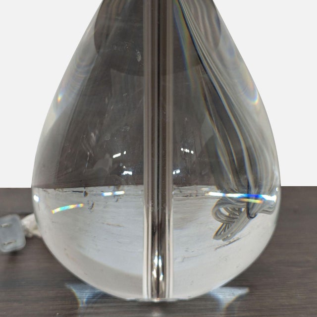This Jonathan Adler table lamp features a lead crystal teardrop base and a sleek black lampshade. Its modern, minimalist...