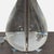 This Jonathan Adler table lamp features a lead crystal teardrop base and a sleek black lampshade. Its modern, minimalist...