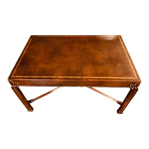 A Brown Leather-Clad Low End Table C. 1930; With Paper Label "McWilliams Hardware & f.c. / B&s Co."