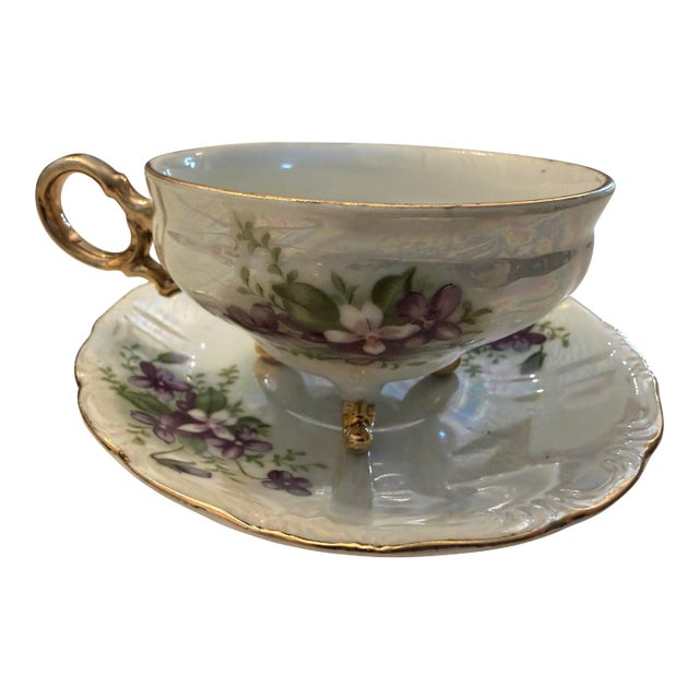 Vintage Iridescent Porcelain Teacup and Saucer With Violets and Gold Trim. For Sale