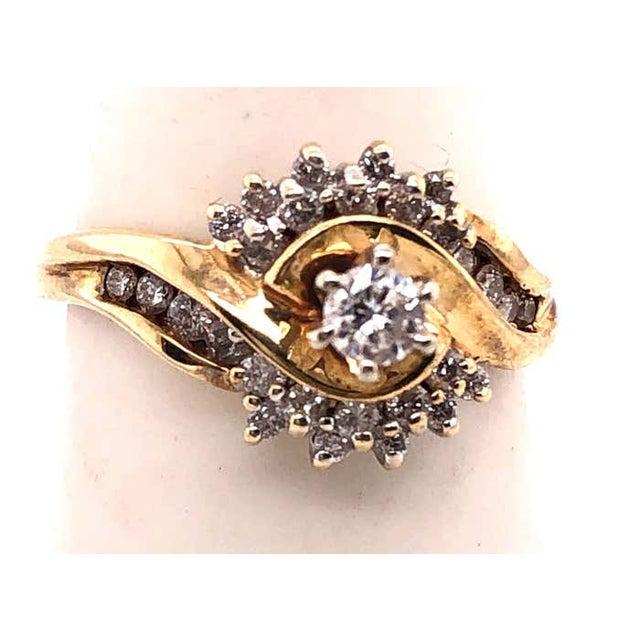 14Kt Yellow Gold Engagement Ring 0.55 Total Diamond Weight. Size 7 with 3.50 grams total weight.