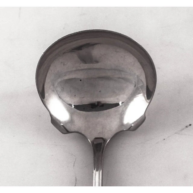 We are delighted to offer this sterling silver gravy ladle by Wallace Silversmiths in the “Princess Mary” pattern....