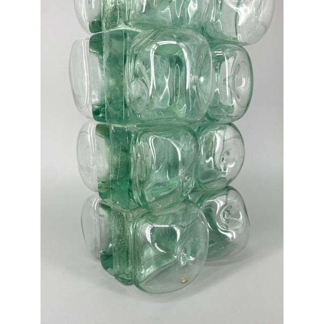 A sculpture * Unique glass object * Consisting of 16 glass blocks, artfully "blown" * Interesting compositions of serial...