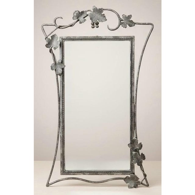 This is a fun garden set! The pieces are a combination of iron and wicker. The set is attributed to Pulaski. All three...