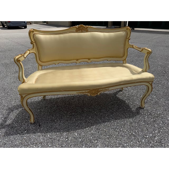 This hand-carved and decorated wooden sofa from the mid-19th century captures timeless French elegance. Featuring a...
