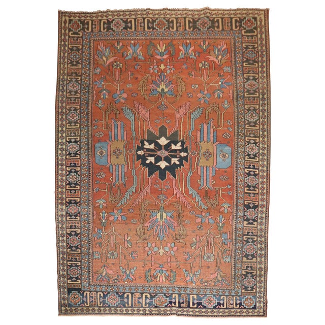 A traditional early 20th century Persian Heriz scatter size rug Measures: 3'4'' x 4'6''.