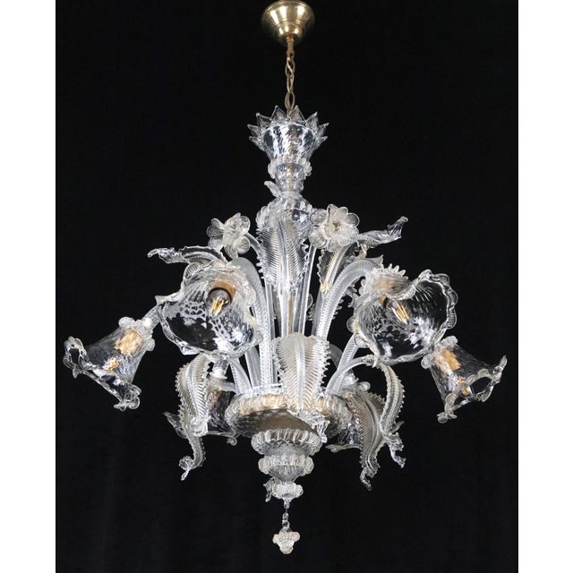 Large six arm Murano style glass chandelier with quilted down light shades and up and down leaves with flowers. The glass...
