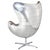 "The Cruz Egg Chair has all the aviator glam of the 1950's. This classic design has a rustic brown leather with stitching...