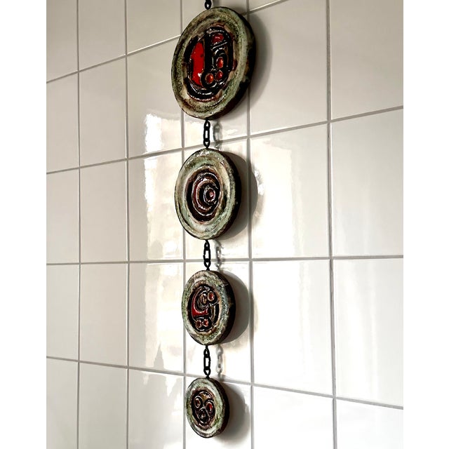 This sculptural high quality ceramic art wall hanging was hand-crafted at the renown Ruscha Art workshop in West-Germany...