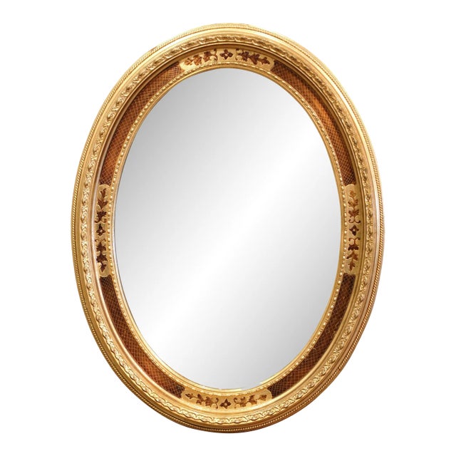 Mid-20th Century French Oval Giltwood Mirror With Floral Motifs For Sale