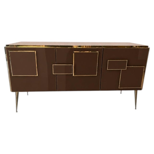 Contemporary Italian three-door sideboard handcrafted in 2026 with deep chocolate-brown glass, solid wood and polished...