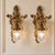 Elevate your walls with this striking pair of French-style crystal wall sconces, featuring beautifully sculpted bronze...