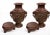 Impressive pair of antique Chinese bronze vases, dating to the late 19th to early 20th century, each featuring an...