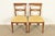 A gorgeous pair of Regency style side chairs or dining chairs In the manner of Kindel Furniture USA, Circa 1960s Carved...