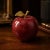 Hand-carved from a single block of genuine Afghan red onyx, this apple is finished with a solid brass stem and leaf. The...