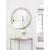 The Plaza Mirror is designed with a round, beveled frame and gold accents. Boasting a modern, art deco aesthetic that's...