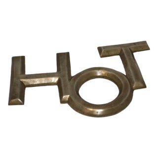 1960s Mid Century Modern Brass Beveled Edge Footed Hot Word Shaped Trivet For Sale