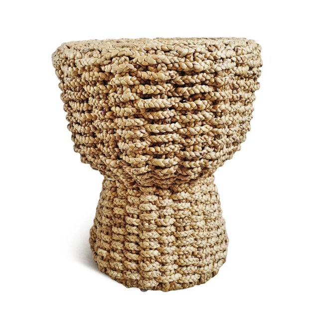 Beautiful hand braided and woven rattan cork shaped stool or side table. Iron frame underneath for sturdiness. Natural...