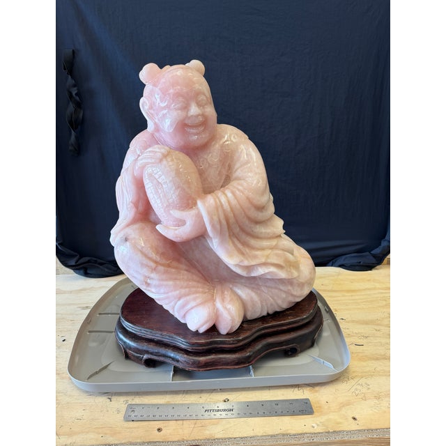 Impressive large-scale vintage Chinese hand-carved rose quartz figural sculpture depicting a smiling boy holding an...