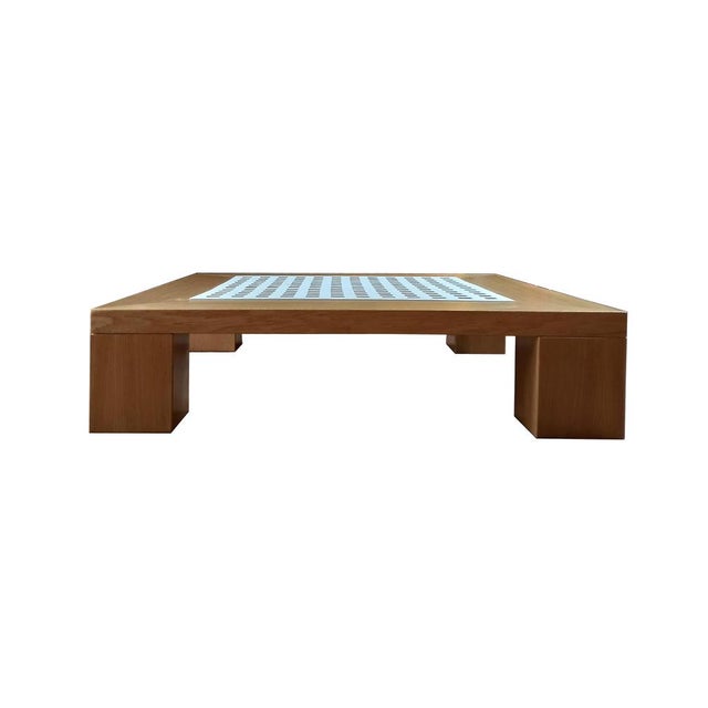 "Quadro" coffee table by Ferdinando Meccani, 1969. Square oak table with white painted carabotto, made in 1995 by the...