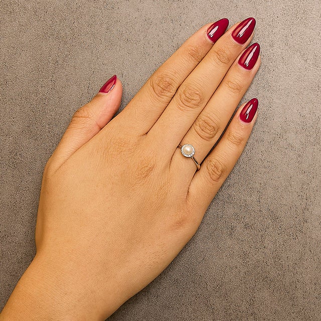 Early 21st Century 10K White Gold 5MM Cultured Freshwater Pearl and Diamond Halo Ring (I-J Color, I1-I2 Clarity) - Ring - Size 5.5 For Sale - Image 5 of 6
