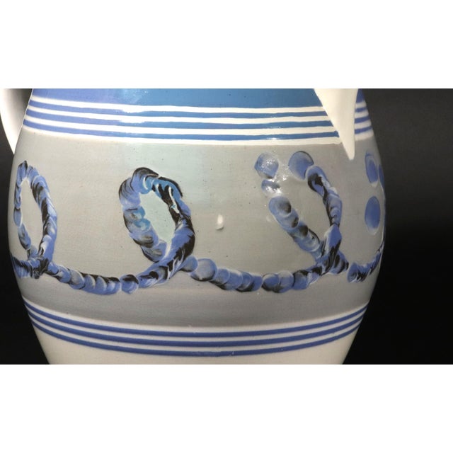 Large English Pearlware Mocha Earthworm Jug, Staffordshire or Northern England, Circa 1810-20. A handsome and generously...