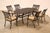 High Quality Outdoor Dining Set Featuring Cast Aluminum Construction With Oval Dining Table And Six Arm Chairs. Decorated...