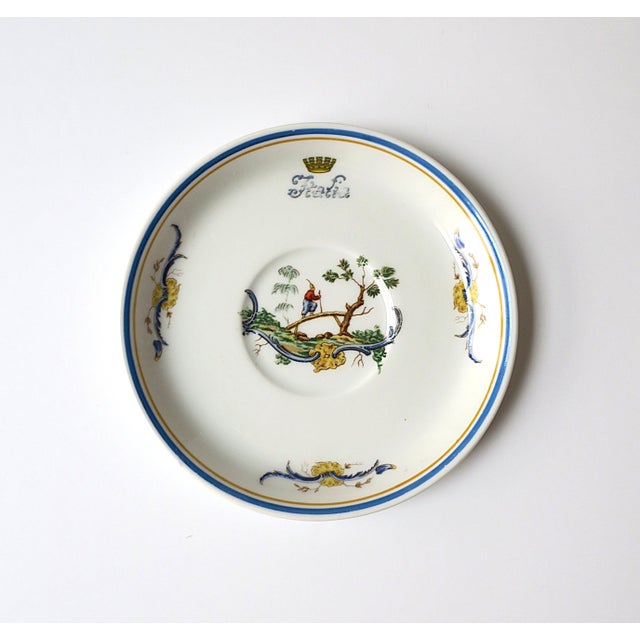 An Italian porcelain saucer dish by designer Richard Ginori, in the Chinoiserie design style, circa early to mid-20th...