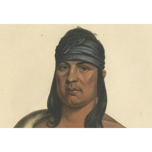 The Resolute Guardian: Pa-She-Pa-Haw, A Sauk Chief This lithograph is of Pa-She-Pa-Haw, a leader of the Sauk tribe, also...