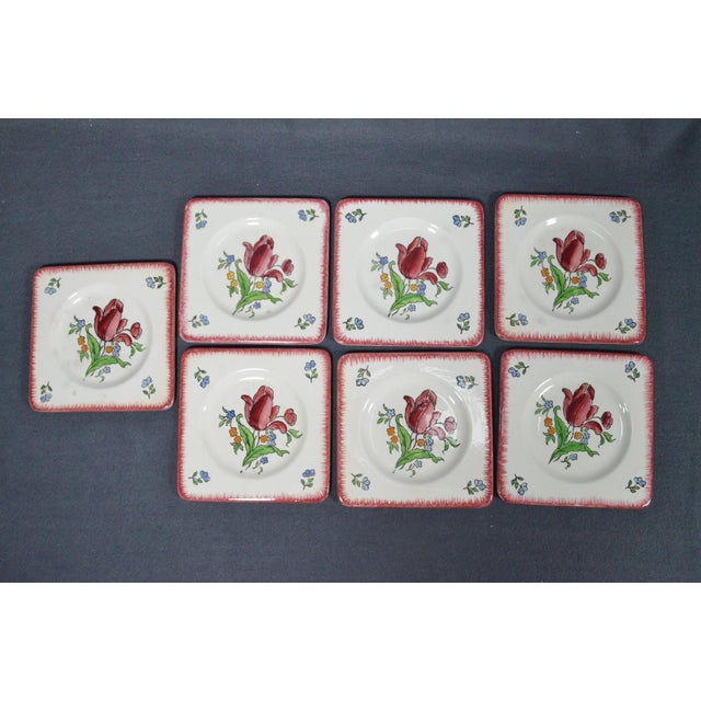 Gien, France “Lorraine” Pattern Circa 1950s A charming eight-piece French faience serving set by Gien in the delightful...