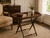 Charming and richly detailed, this 1930s oak butler’s tray table embodies the warmth and craftsmanship associated with...