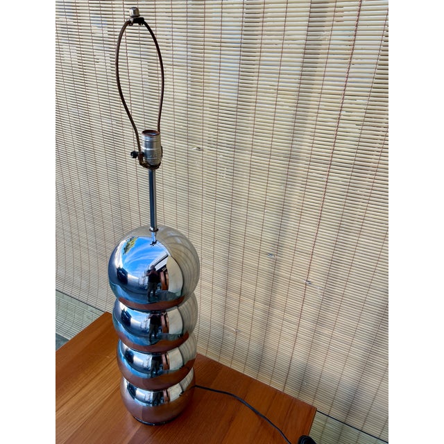 Vintage Mid Century Modern Chrome Stacked Ball Table Lamp in the George Kovacs' Style. Circa 1970s Features four...