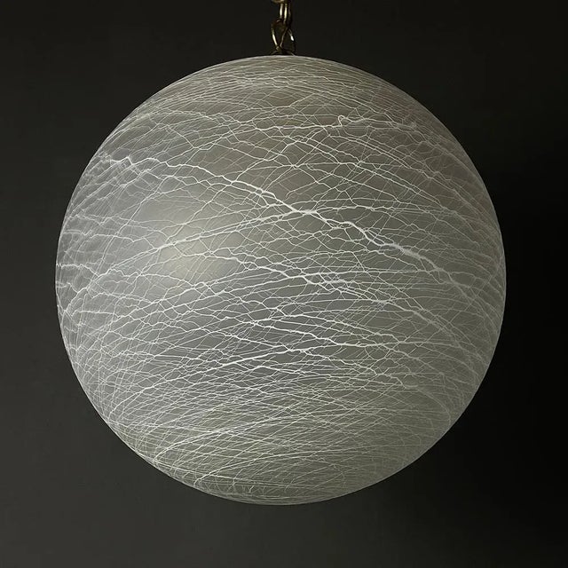 This large, beautiful vintage swirl Murano lamp was made in Italy in the 70s. Perfect vintage condition. No chips or...