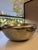 Add a touch of understated elegance to your space with this sculptural silver-tone metal bowl, crafted in India. Featuring...