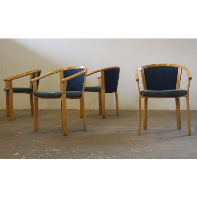 set of four dining chairs in light beech wood bended was designed by Rud Thygesen and Johnny Sørensen and manufactured in...