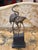Bronze sculpture of two flamingos standing on a stepped plinth, signed Franz Mazura. The birds are modeled with detailed...
