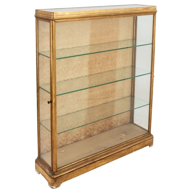 Giltwood Rectangular Display Case, early 20th century, fitted with a door to one end, enclosing three glass adjustable...