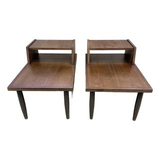 Pair of Vintage Mid-Century Modern Walnut Step Side Tables With Magazine Shelves For Sale