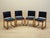 The set of four chairs made in the 1950s, designed by renowned Danish designer Holger Jacobsen. Manufactured by Danish...