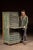 Tall, narrow flat file cabinet in original green painted finish, built for the storage and handling of large-format...
