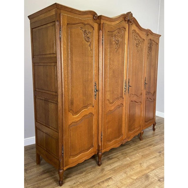 Vintage French Louis XVI Style Carved Oak 4-Door Armoire For Sale - Image 3 of 14
