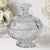 A beautifully crafted vintage crystal covered pedestal dish featuring an elegant all-over floral motif with stylized rose...