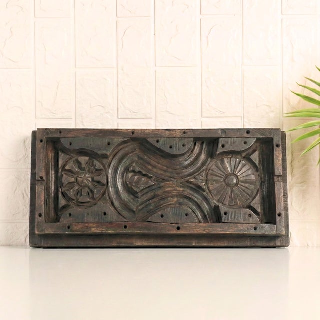 Step into a realm where history meets artistry with our Vintage Carved Wood Mold, a rare treasure that breathes the soul...