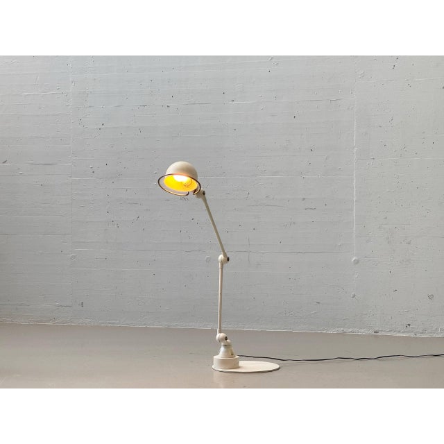 Iconic industrial floor lamp from jielde, designed by the french engineer jean-louis domecq and manufactured in lyon. This...