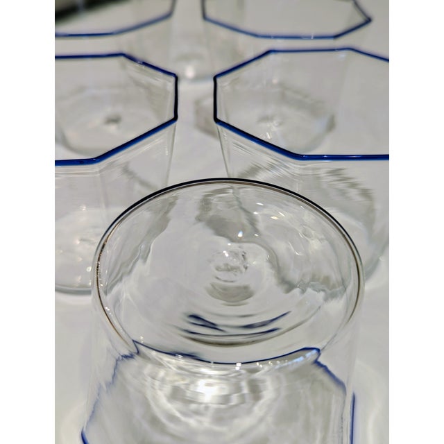 Set of 6 Venini hand-blown Murano lowball glasses featuring octagonal form and applied cobalt rim. Excellent condition....