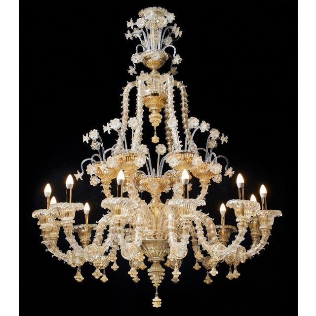 Ca rezzonico i 12 lights chandelier in gold plate and murano glass by aggiolight. Dimensions: d 120 x h 160 cm (+ 100 cm...