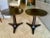 Pair of round top dark walnut/espresso lacquered finish wood side or end tables by Kittinger Furniture Company. Solid hard...