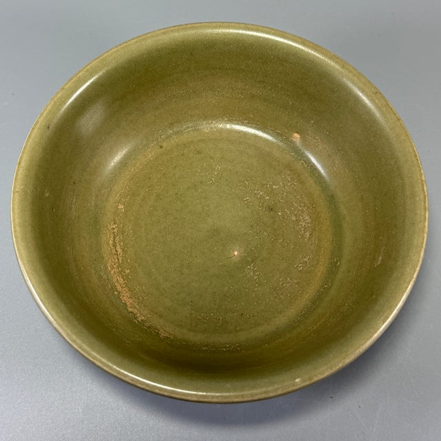 Fine antique Chinese celadon bowl. Elegant flared‑rim shape coated in rich olive‑green celadon glaze, attractive...