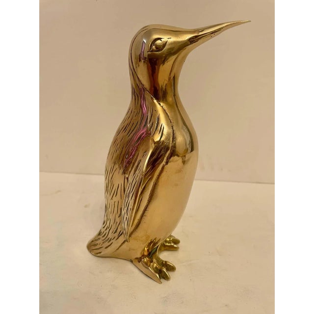 Vintage Hollywood Regency brass Penguin sculpture. Nicely detailed. Hand polished. Good overall condition. Dark spots are...